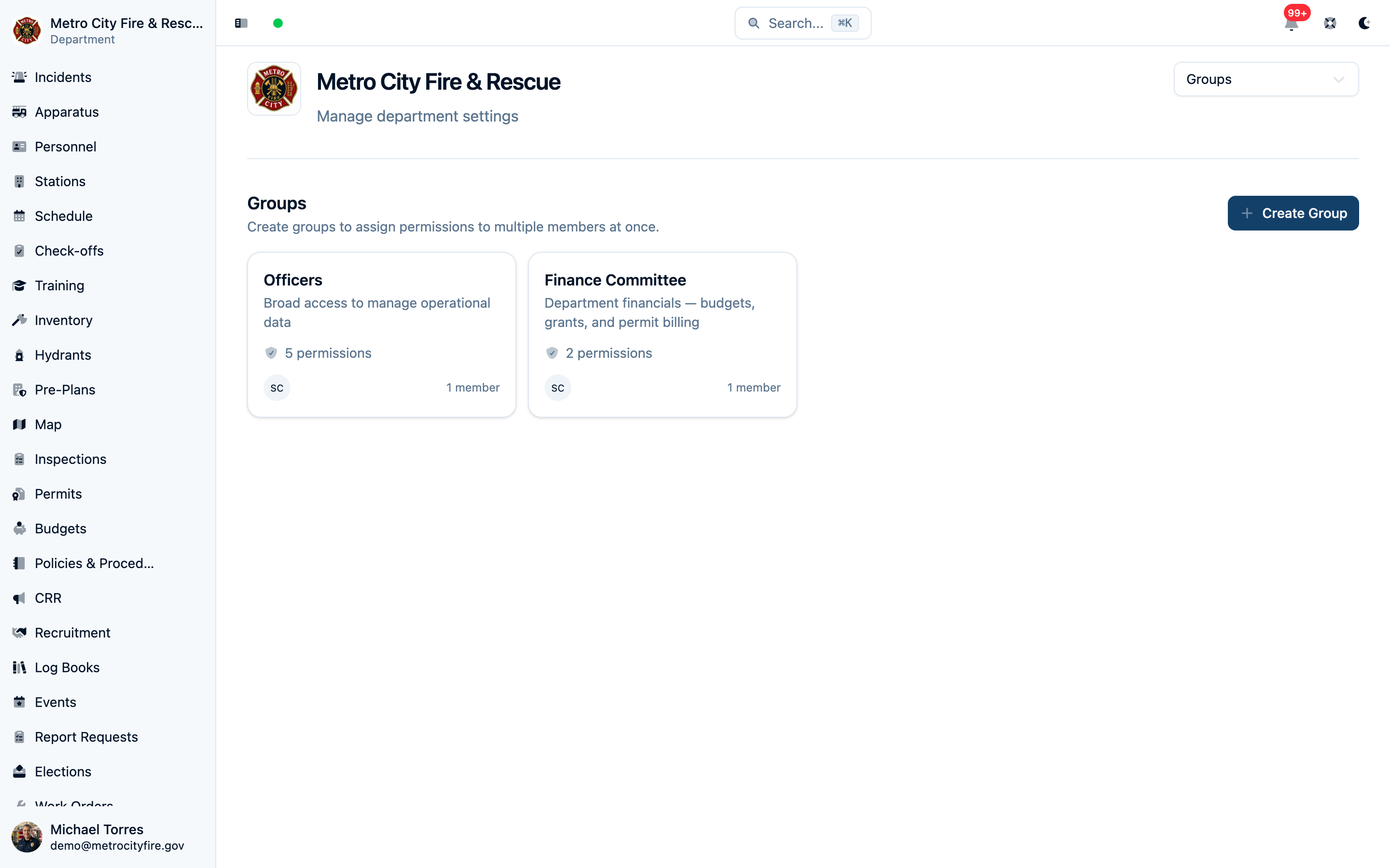 The Groups settings page showing group cards with their permission counts and members
